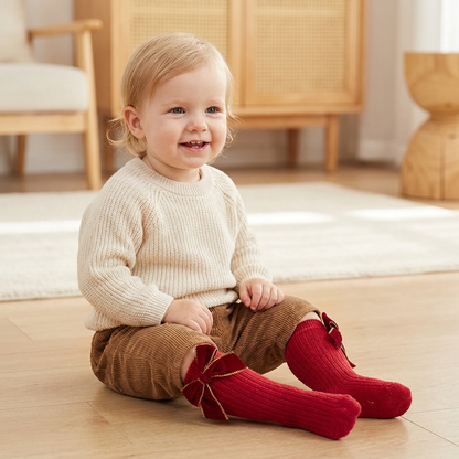 Weihnachtliche Kniestrümpfe für Baby-Mädchen mit Samtschleifen